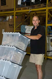 hardpack employee with hand truck